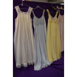 Five nylon nightdresses including double layered Kayser and blue single layered Kayser, one white