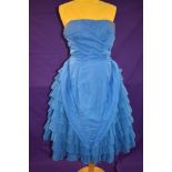 A vintage 1950s electric blue strapless Jean Allen dress with layered skirt and integrated