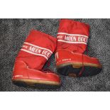 An original pair of 1980s red moon boots, approx size 9 or 10.