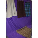 Four vintage 1950s skirts, one having ILGWU label, another with a Stockton of Dallas label having