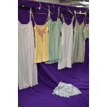 Five vintage slips, a camisole top and a pair of cami knickers, including silk,rayon and nylon,
