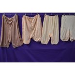 Four pairs of 1940s CC41 bloomers , all having really crisp clear utility labels, in various sizes