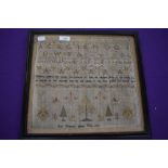 A Framed sampler with finish date of 1797, depicting Alphabet, animals and proverbs, and a name of