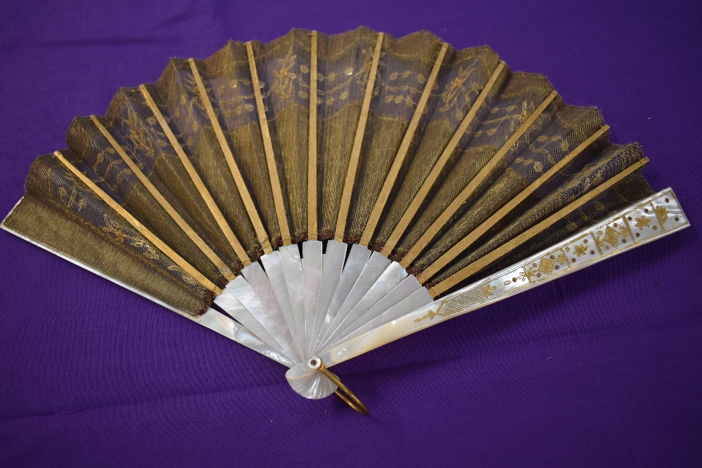 A late 19th early 20th century silk fan having sequins and spangles with mother of pearl ribs with - Image 2 of 2