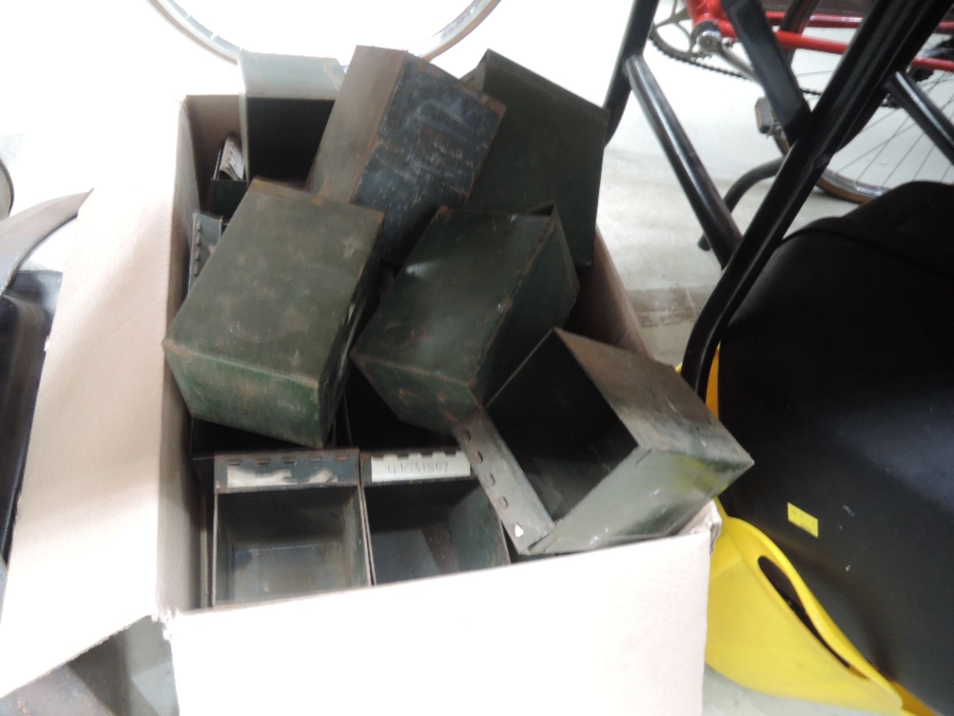 A large quantity of parts boxes from a parts shelf, various sizes.