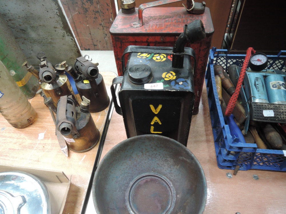 A petrol can having shell cap plus spare unbranded cap, a decorative Valor can and water separator.