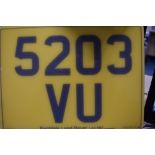 A private registration number plate on retention 5203VU
