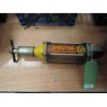 An unusual Carburol petrol one shot treatment injector.AF.