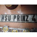 An NSU Prinz showroom number plate.