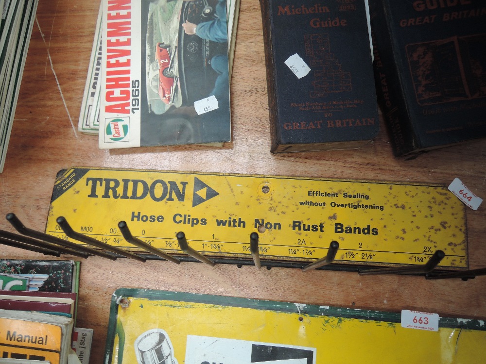 A vintage Tridon Hose clip rack.