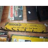A vintage Tridon Hose clip rack.