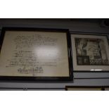 A framed print of classical music score Eric Satie