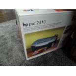 A HP psc 2410 printer in box.