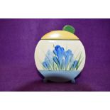 A Clarice cliff condiment or preserve jar with lid having crocus pattern in blue.