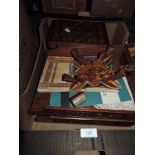 An antique inlaid wooden box with key, two carved oak desk top stacking shelves and a shuttle,