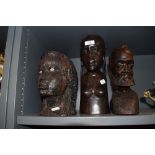 A selection of African heads carved from heavy ethnic woods