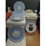 A collection of Wedgewood christmas plates, around 15 in total.