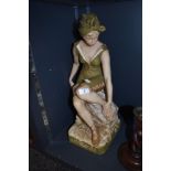 A large Royal Dux figure of a seated bather in traditional costume having stamped Lozenge to base in