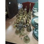 A large lot of brass bells, varied sizes and styles.