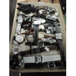 A large collection of watches, mixed styles and brands including Henleys and Zippo.