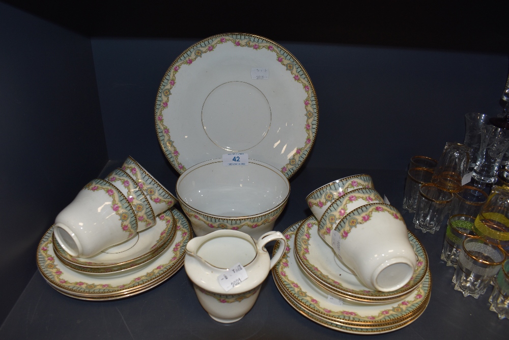 A part tea service having transfer print design unmarked