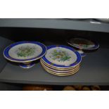 A selection of antique serving plates in hard paste having individual hand painted floral scenes