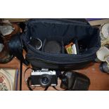 A Mamiya MXS 500 35mm SLR camera with Pentacon 50mm lens, Tamron Auto Zoom 85-205mm l3ns, Mamiya/