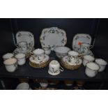 A part tea service by Plant Tuscan China having bright enamel decoration
