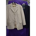 A gents pin striped wool suit jacket and a Rohan beige suit.