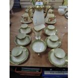 A Royal Doulton part coffee service comprising of coffee pot,creamer,sugar basin and six cups and