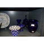 A selection of blue and white glass wares including cut cameo and Bristol blue water jug