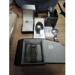 A selection of watches in boxes including Casio and a Togan mount cutter.