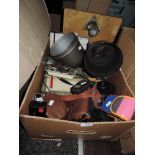 A box full of mixed cameras and equipment including Kodak Instamatic, universal exposure meter and