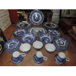 An assortment of blue and white ware including Doulton plate, Wedgewood willow plate and Ironstone