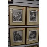 Four black and white classic styled framed prints.