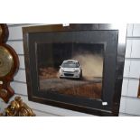 A photographic print of rally car in modern frame