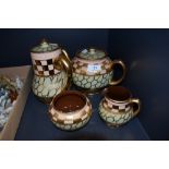 A part tea service by Sadler with green and lustre glaze