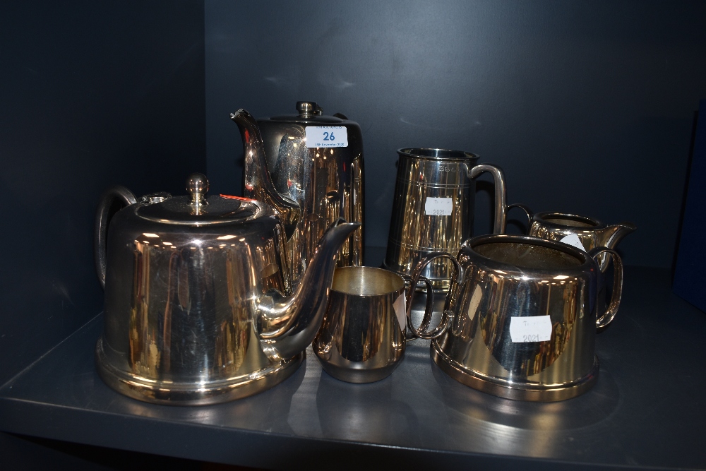A tea set in polished steel with art deco design