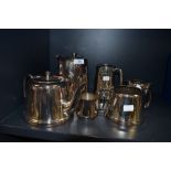 A tea set in polished steel with art deco design