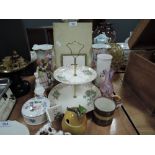 A collection of ceramics amongst which are a floral pattered Falcon Ware cake stand, condiment jar