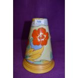 An art deco Shelley vase having bright orange Hibiscus like pattern with blue accents on mint