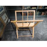 A modern beech frame portfolio picture stand