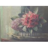 An oil painting, Ila Adams, Flower study, signed and attributed verso, 30 x 39cm, framed and glazed