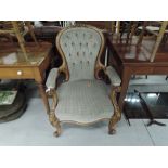 A Victorian bleached mahogany button back dining chair having knurl frame and later upholstery