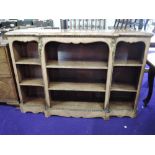 An early 20th Century continental style inlaid part walnut bookshelf, with ormolu effect