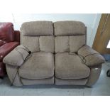A two seater electric reclining sofa with good upholstery