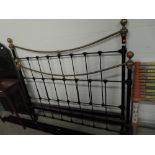 An Anique part brass double bed, includes irons, width approx 135cm