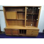 A vintage laminate teak effect lounge display unit, width approx. 183cm