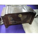 A Chinese bedding box having carved panel decoration