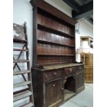 A rustic stained frame farmouse kitchen dresser, width approx. 178cm